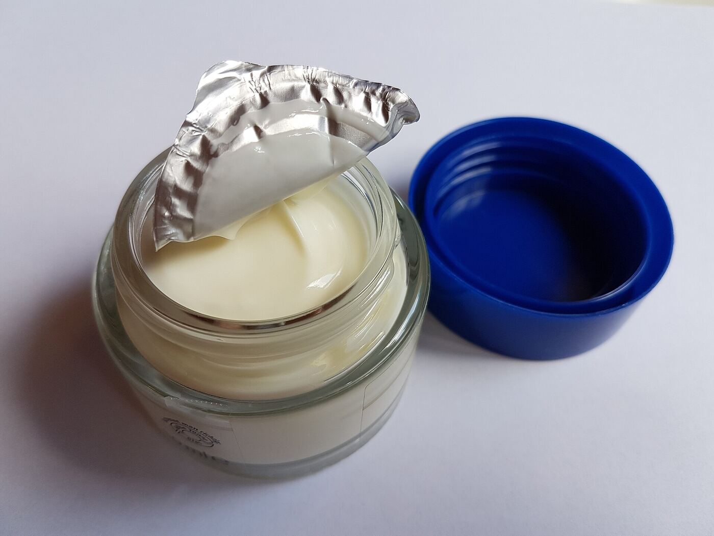 Open jar of day cream