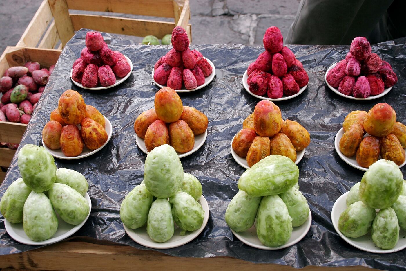 Prickly pear fruits stacked at a market stall